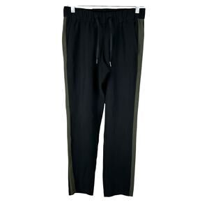 Lululemon On The Fly Pant Woven Track Stripe Black Dark Olive Women's Size 4 EUC